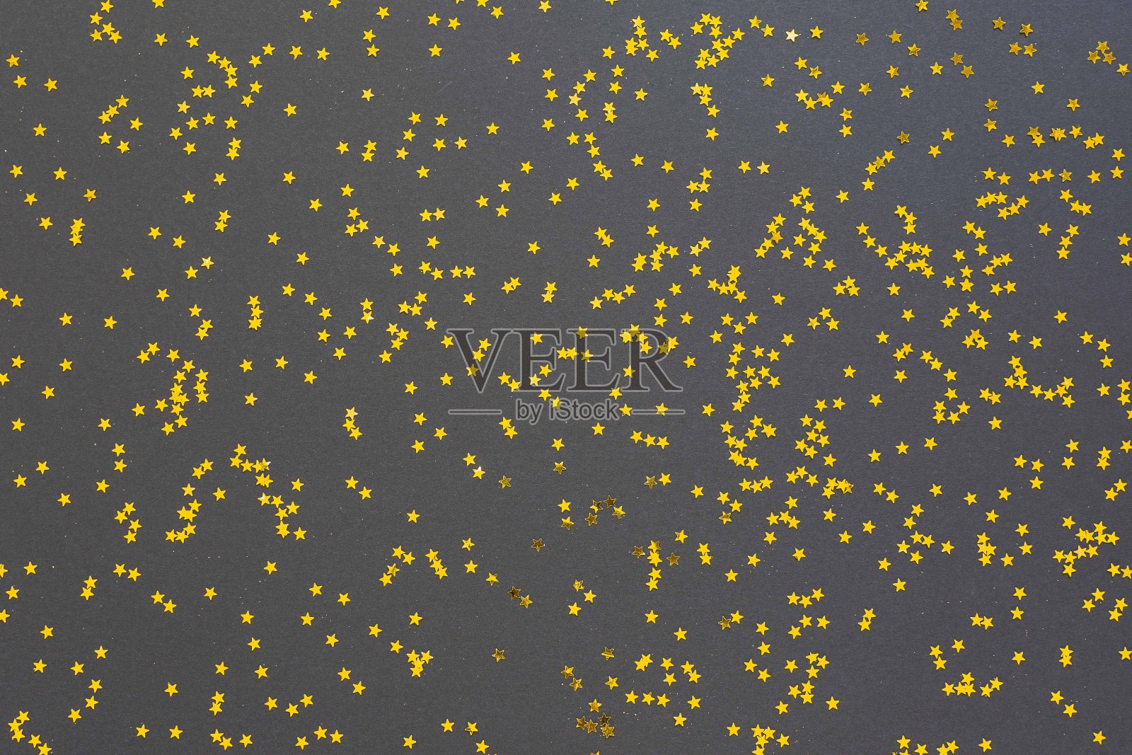 闪烁着金色星星的节日背景照片摄影图片