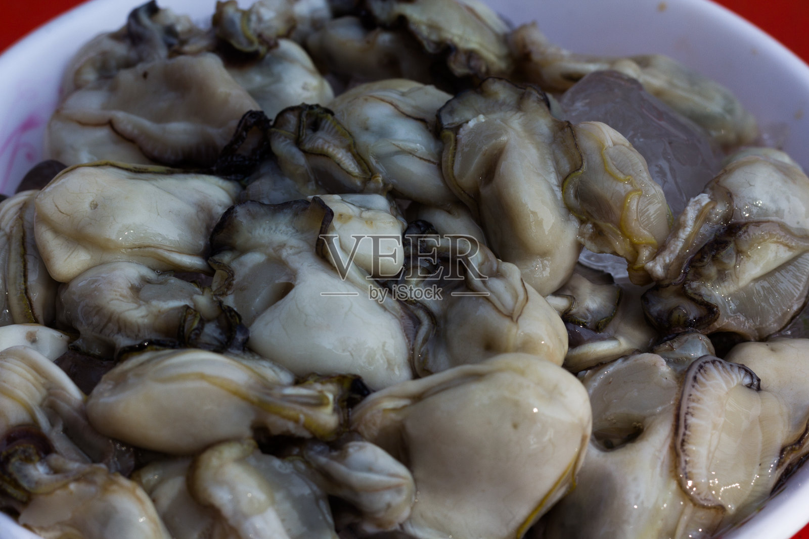 羊牡蛎，然后放在一个即食。照片摄影图片