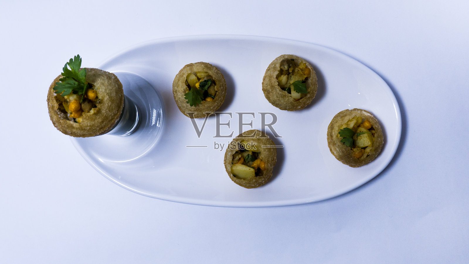 Panipuri和phudina(薄荷)水照片摄影图片