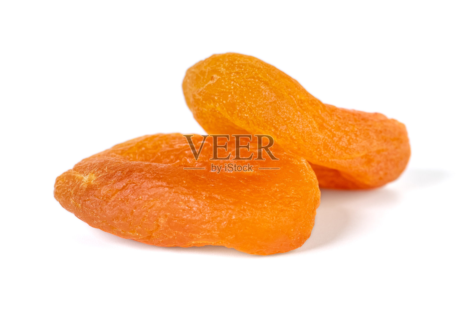 孤立在白色背景上的杏干。健康食品。照片摄影图片
