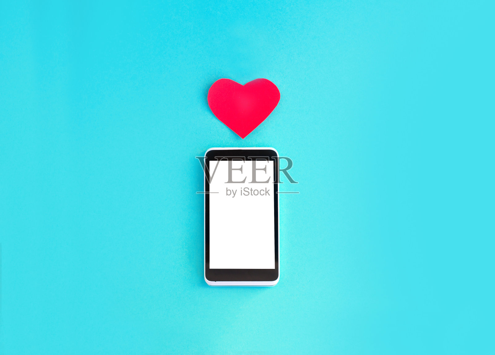 智能手机和心脏照片摄影图片