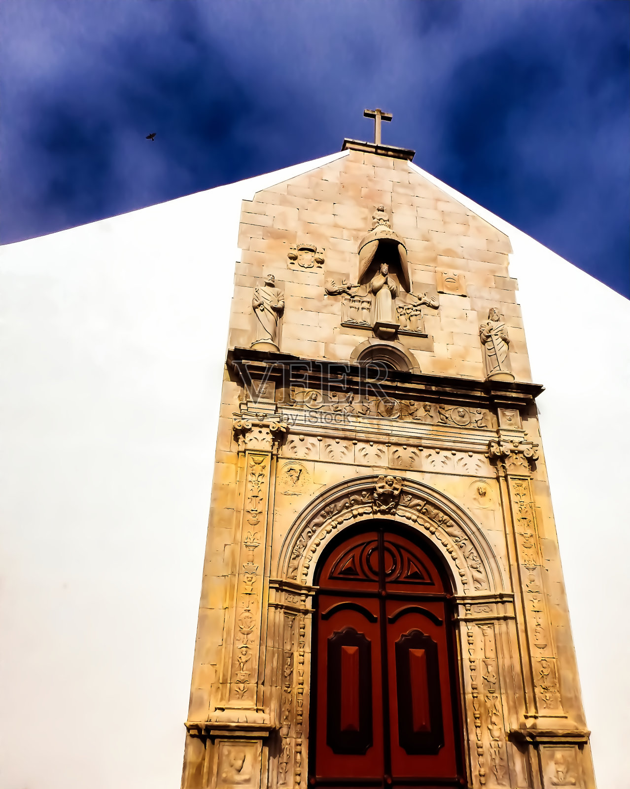 正面是塔维拉一所教堂的门照片摄影图片