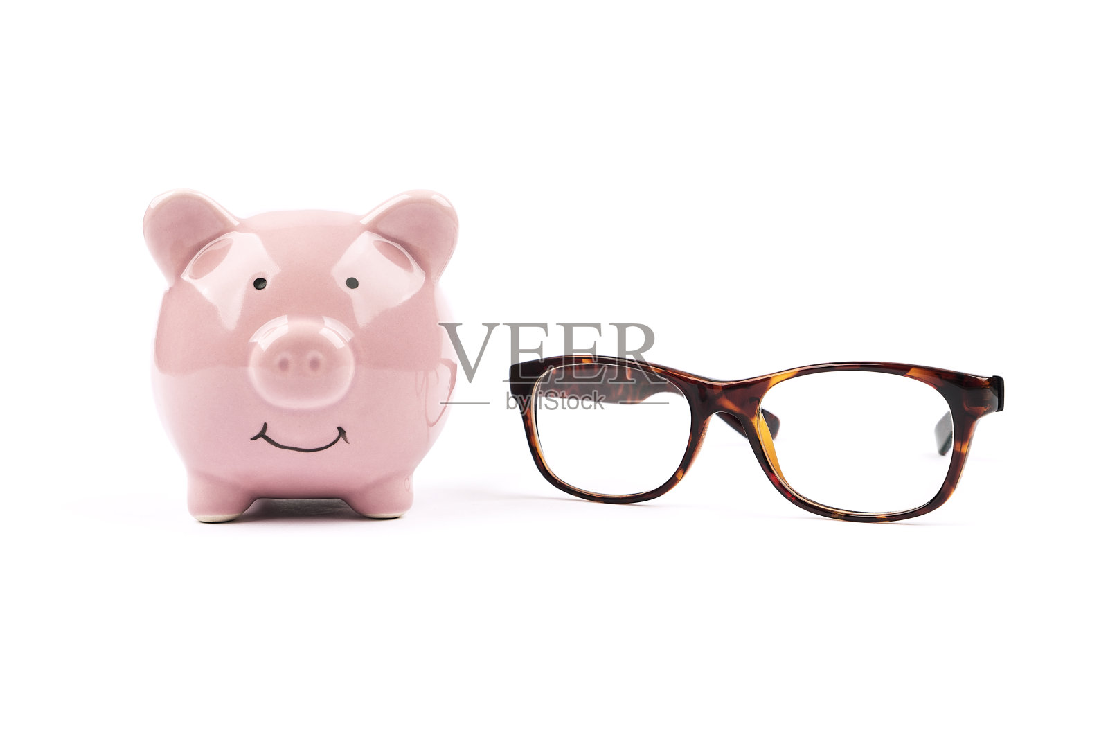 粉红色的储蓄罐孤立在白色的背景照片摄影图片