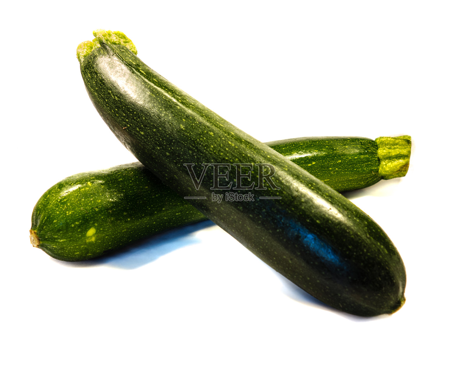 在白色背景上分离的西葫芦照片摄影图片