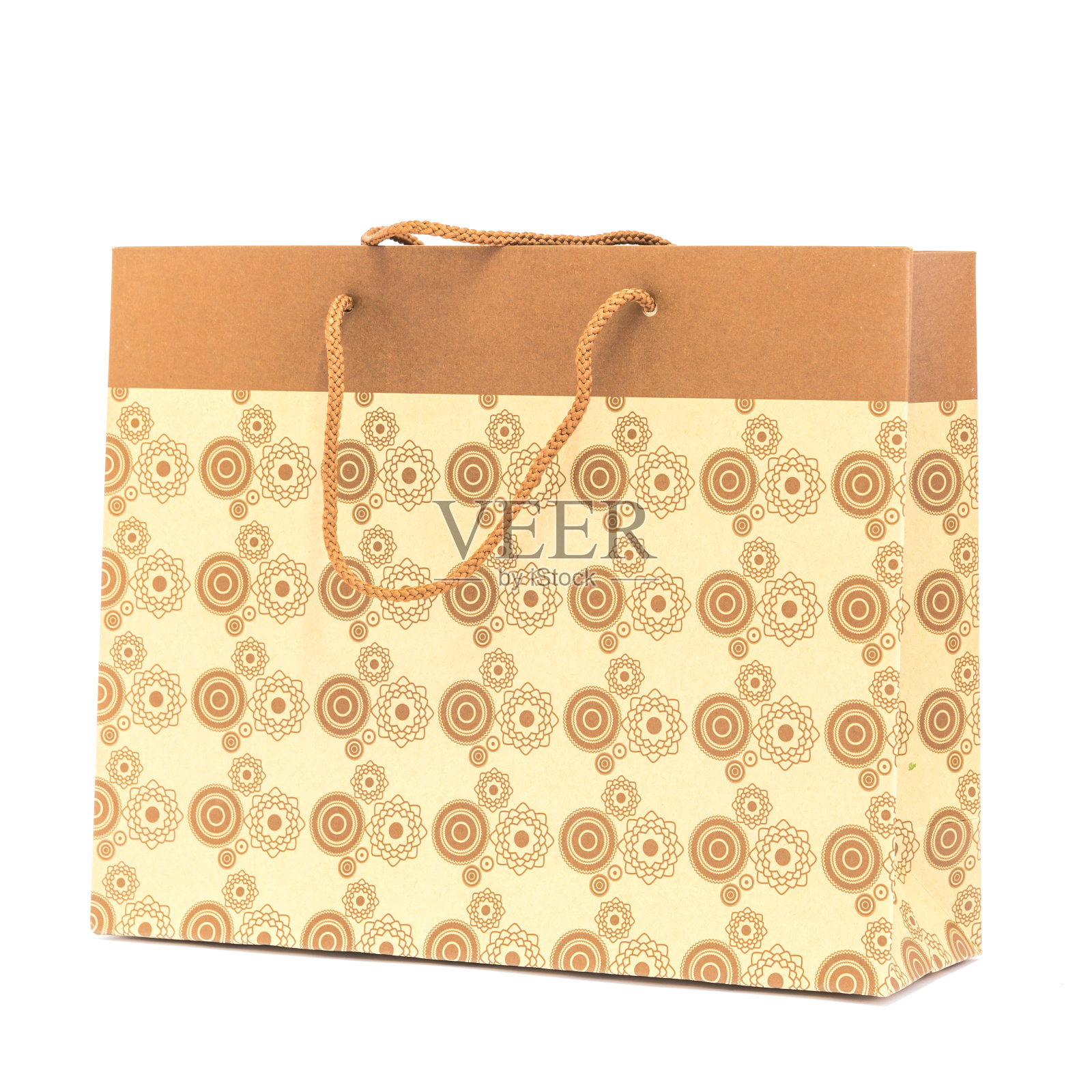 工作室拍摄了一个纸购物袋，白色的扶手孤立照片摄影图片