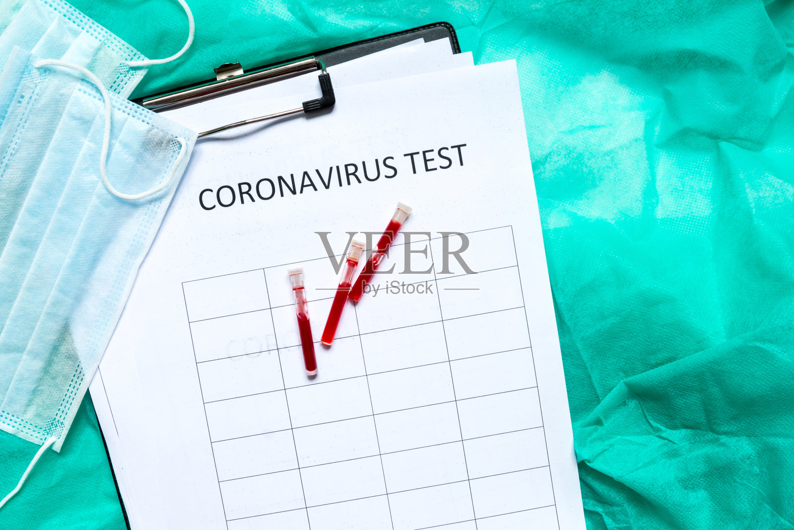 冠状病毒MERS-CoV病毒感染病毒口罩和血液试管进行病毒检测，病毒流行冠状病毒nCov概念照片摄影图片