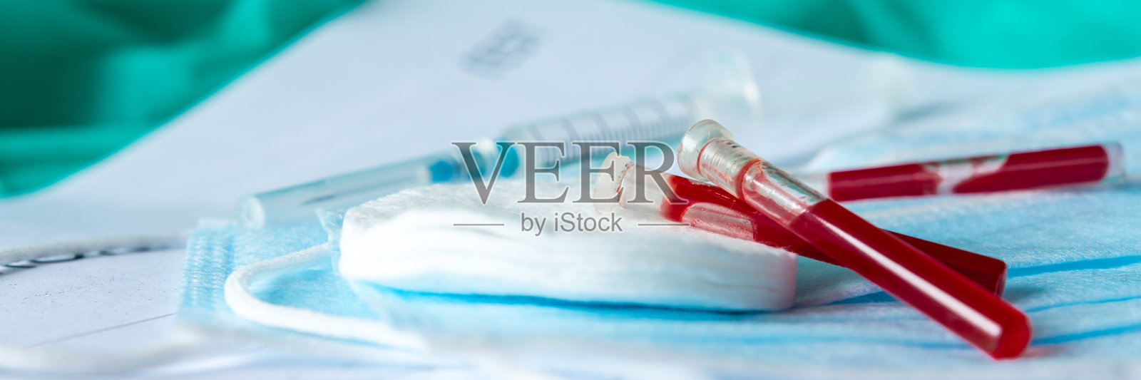 冠状病毒MERS-CoV病毒感染病毒口罩和血液试管进行病毒检测，病毒流行冠状病毒nCov概念照片摄影图片