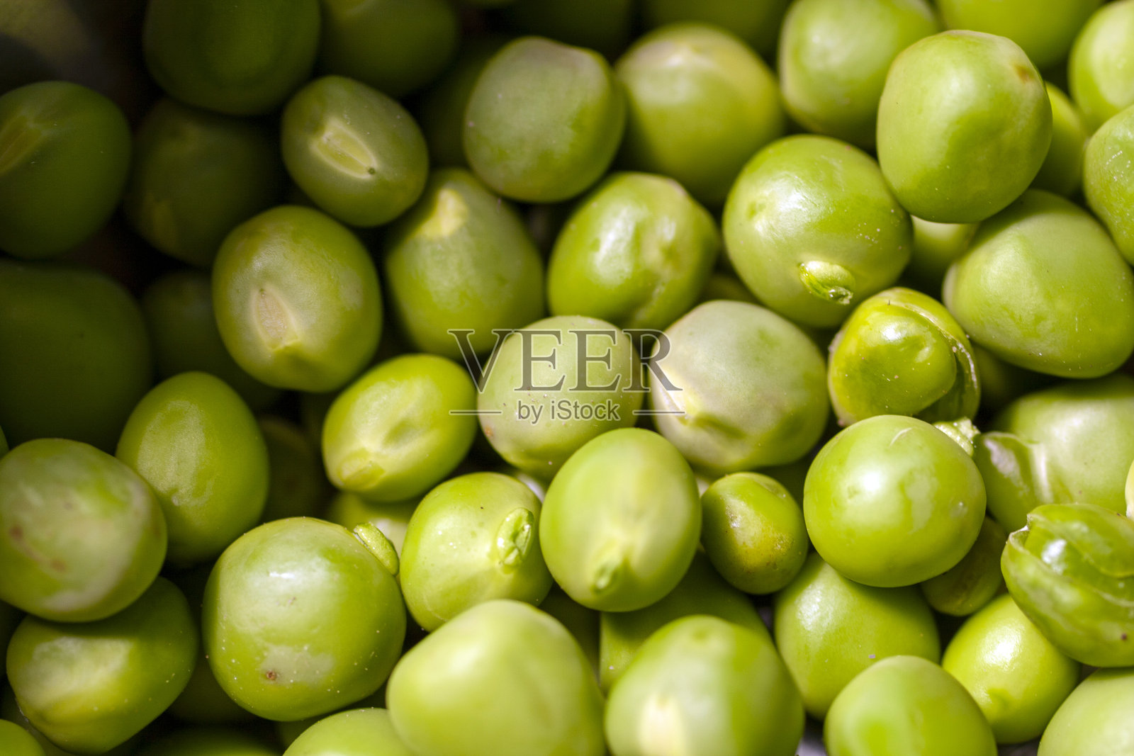 新鲜的绿色豌豆的特写镜头照片摄影图片