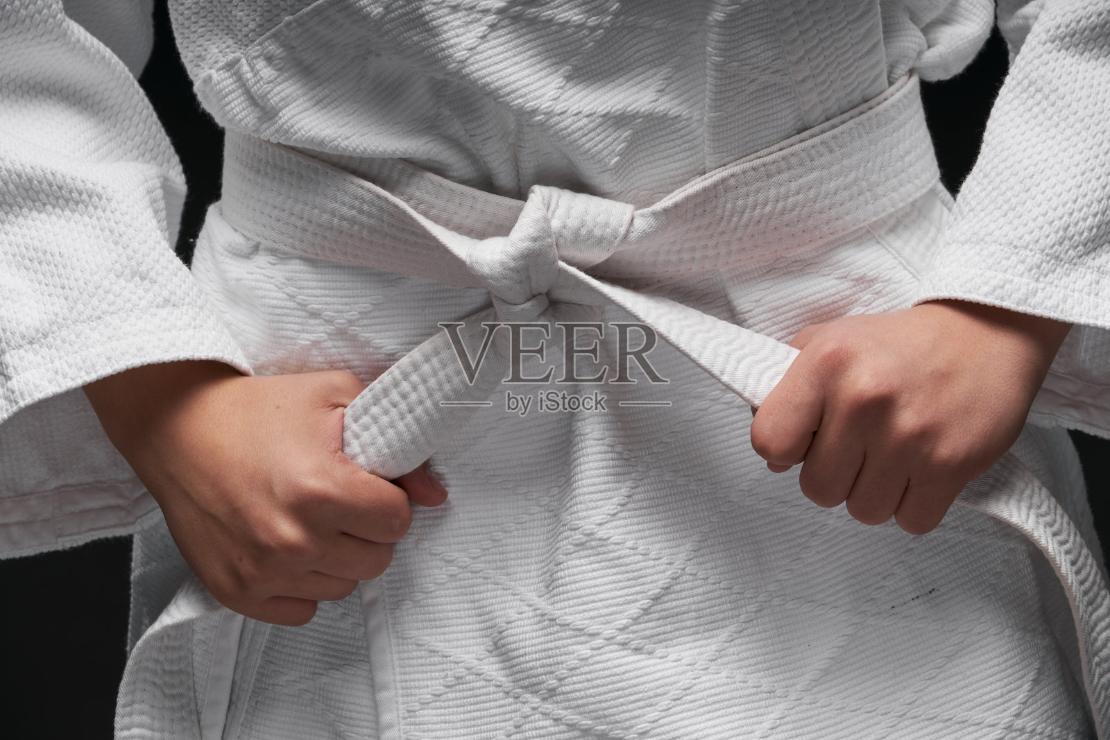 武术服青少年手部特写照片摄影图片