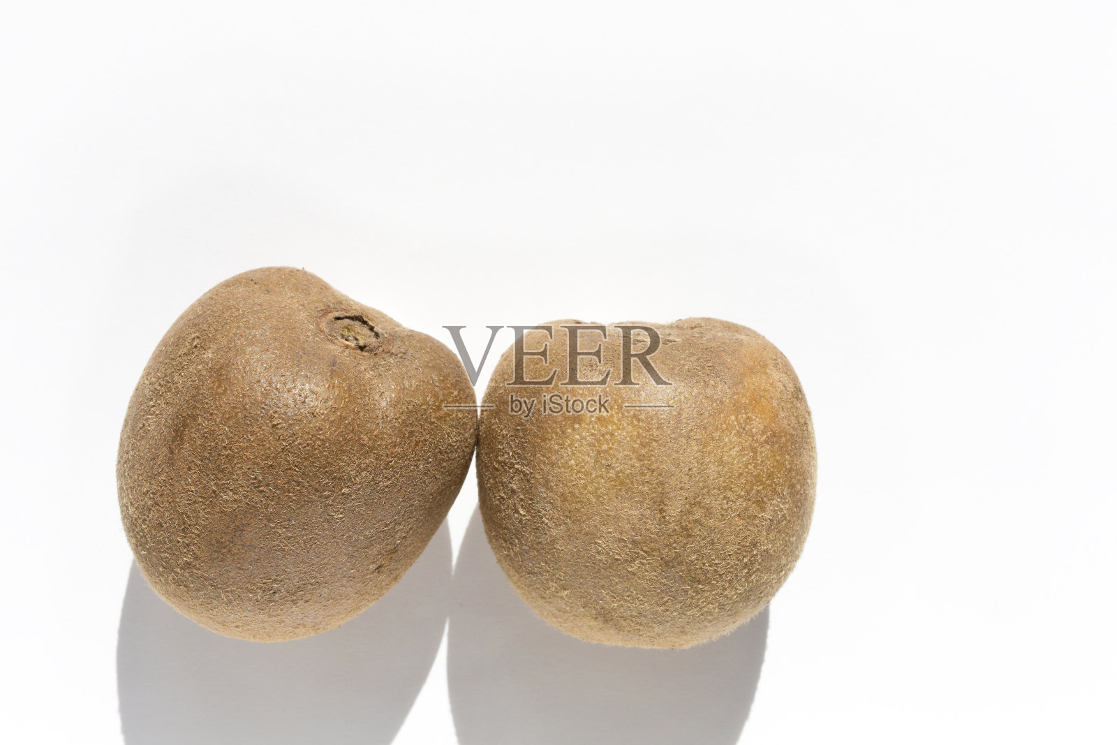 日本产的“苹果猕猴桃”。它之所以这样叫是因为它的形状像苹果。照片摄影图片