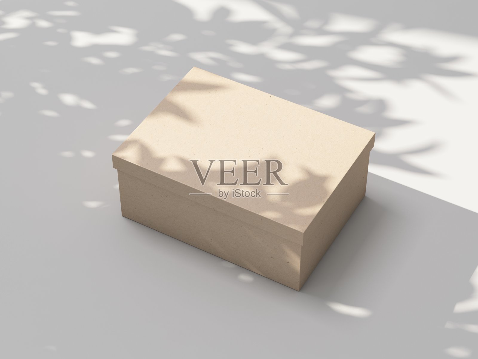 白色桌子上的棕色纸箱模型照片摄影图片