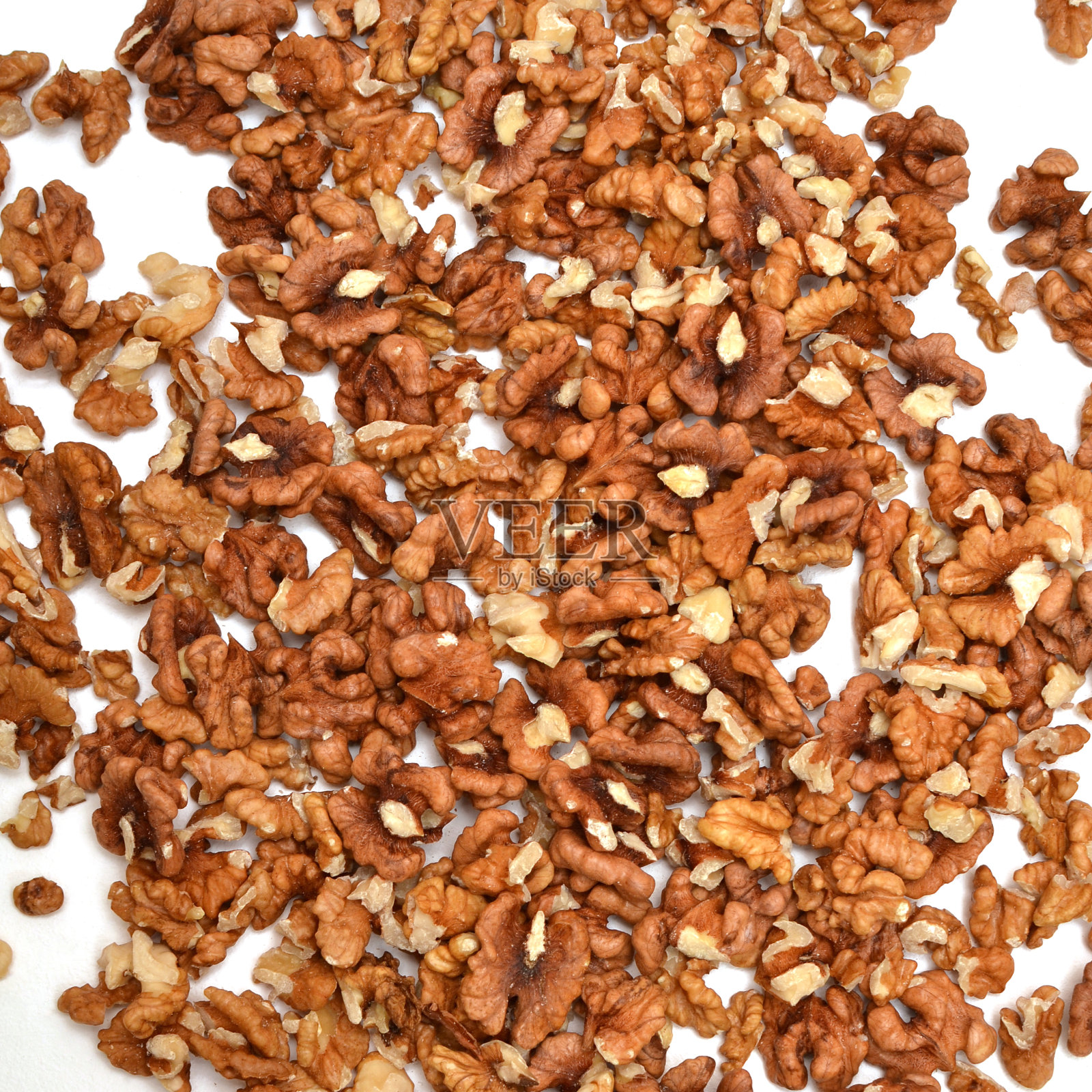 食物背景 - 随意摆放的大个带壳核桃照片摄影图片