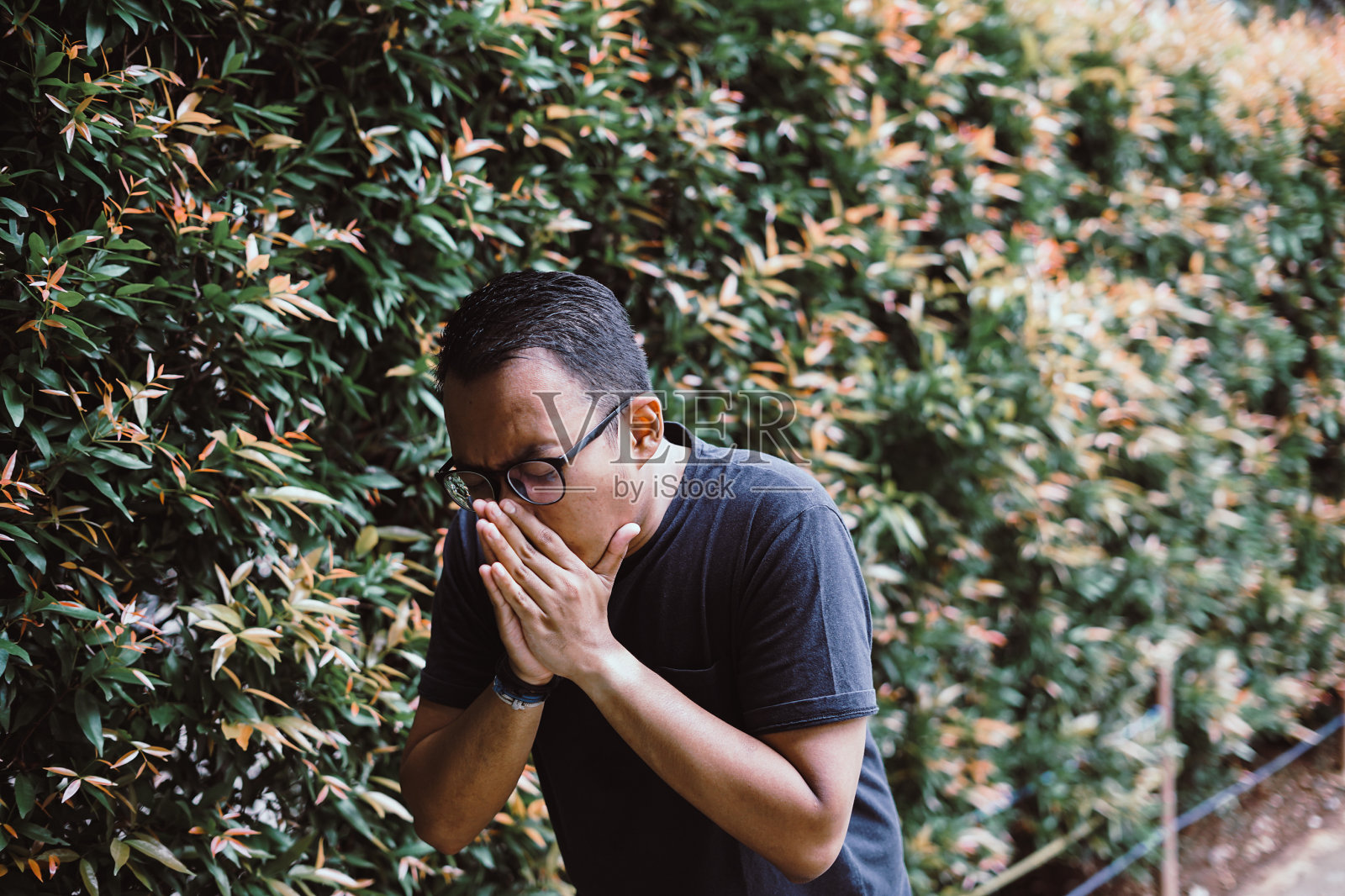 东南亚男子 - 流行性感冒照片摄影图片