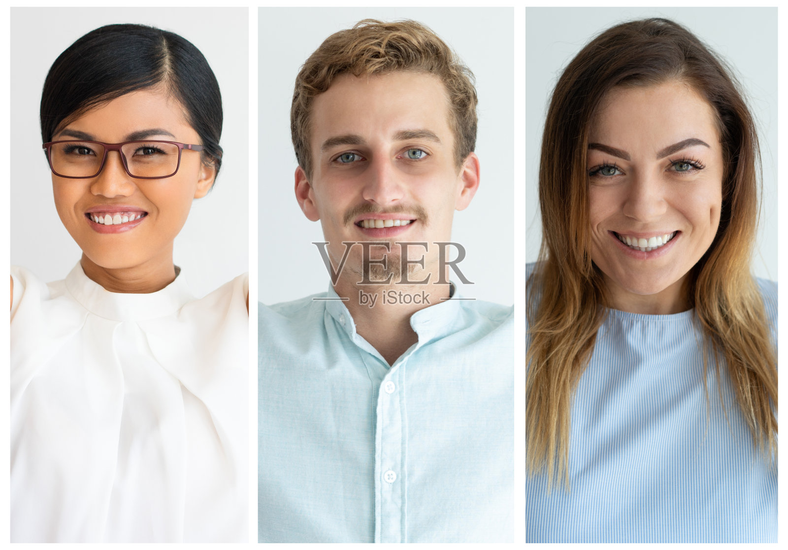 一群面带微笑、充满自信的人看着镜头照片摄影图片