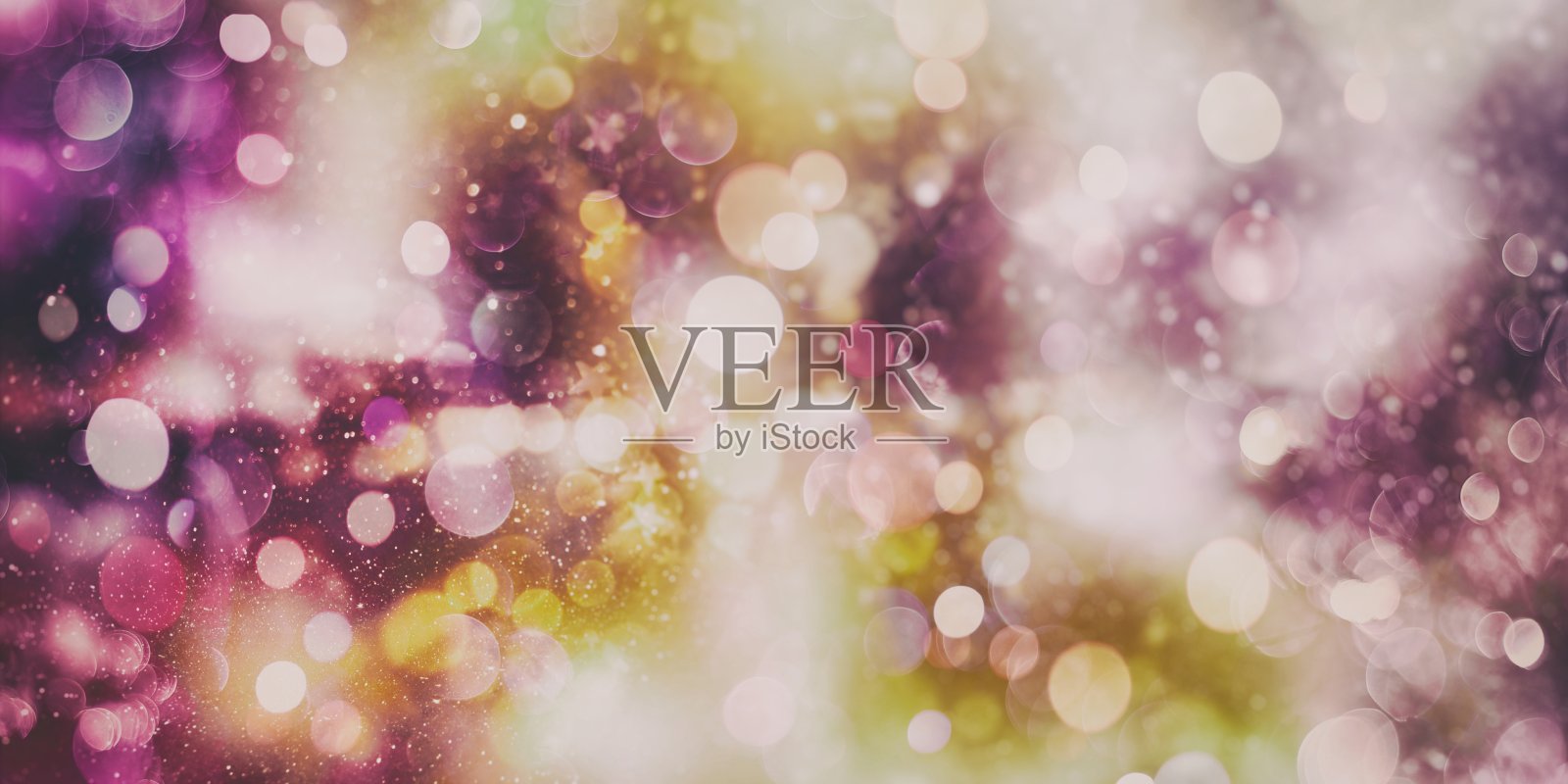 抽象模糊的灯光背景，节日优雅的抽象背景与散景灯光和星星照片摄影图片