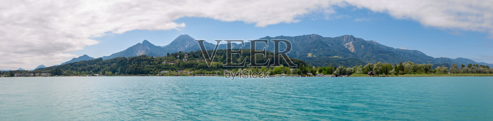 Faaker See与karawwanks阿尔卑斯山的全景，奥地利照片摄影图片