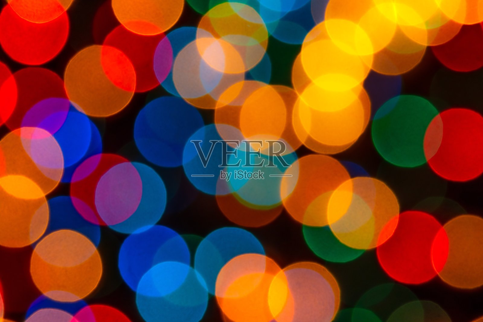 模糊散焦多色灯光。照片摄影图片