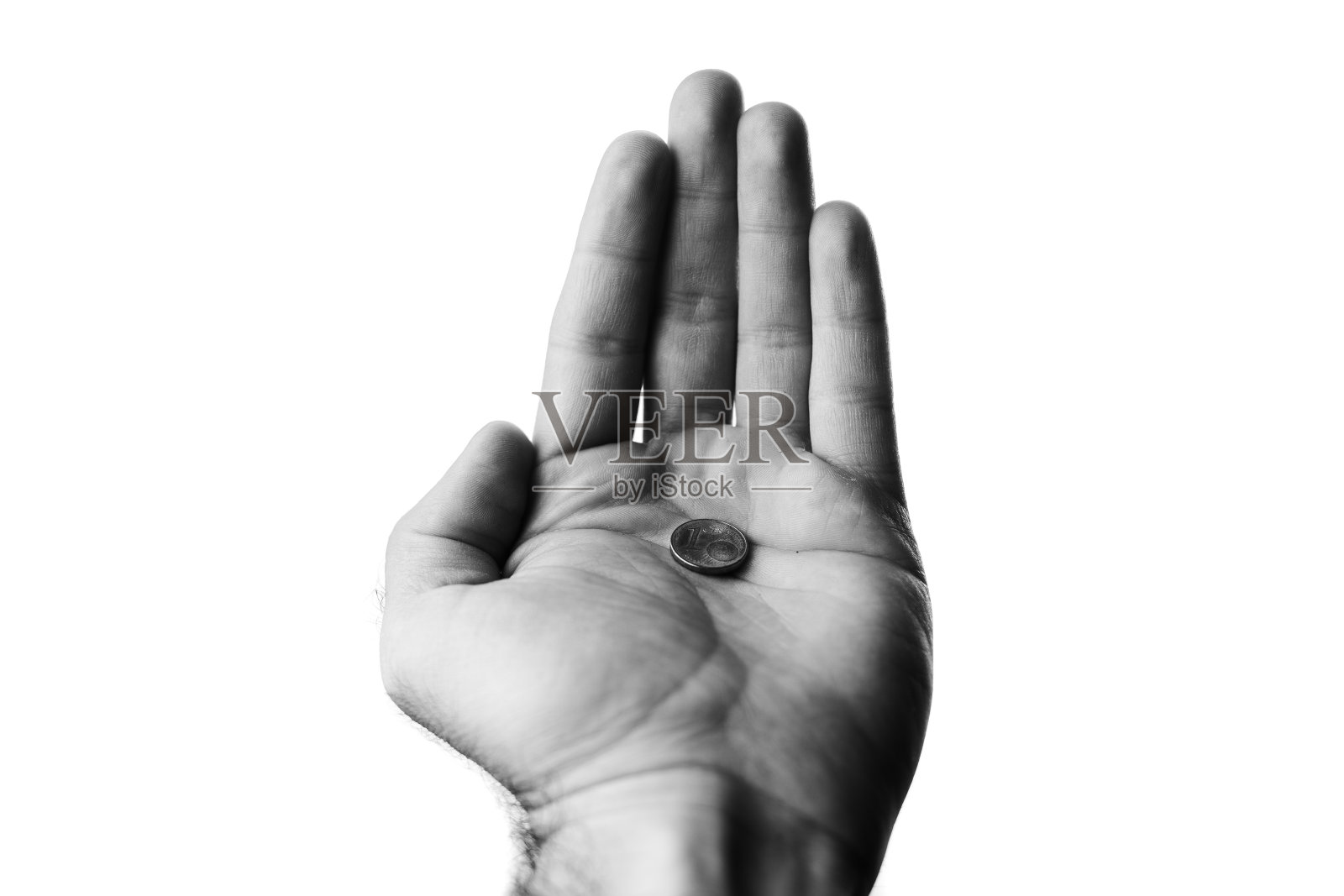 手中的硬币照片摄影图片