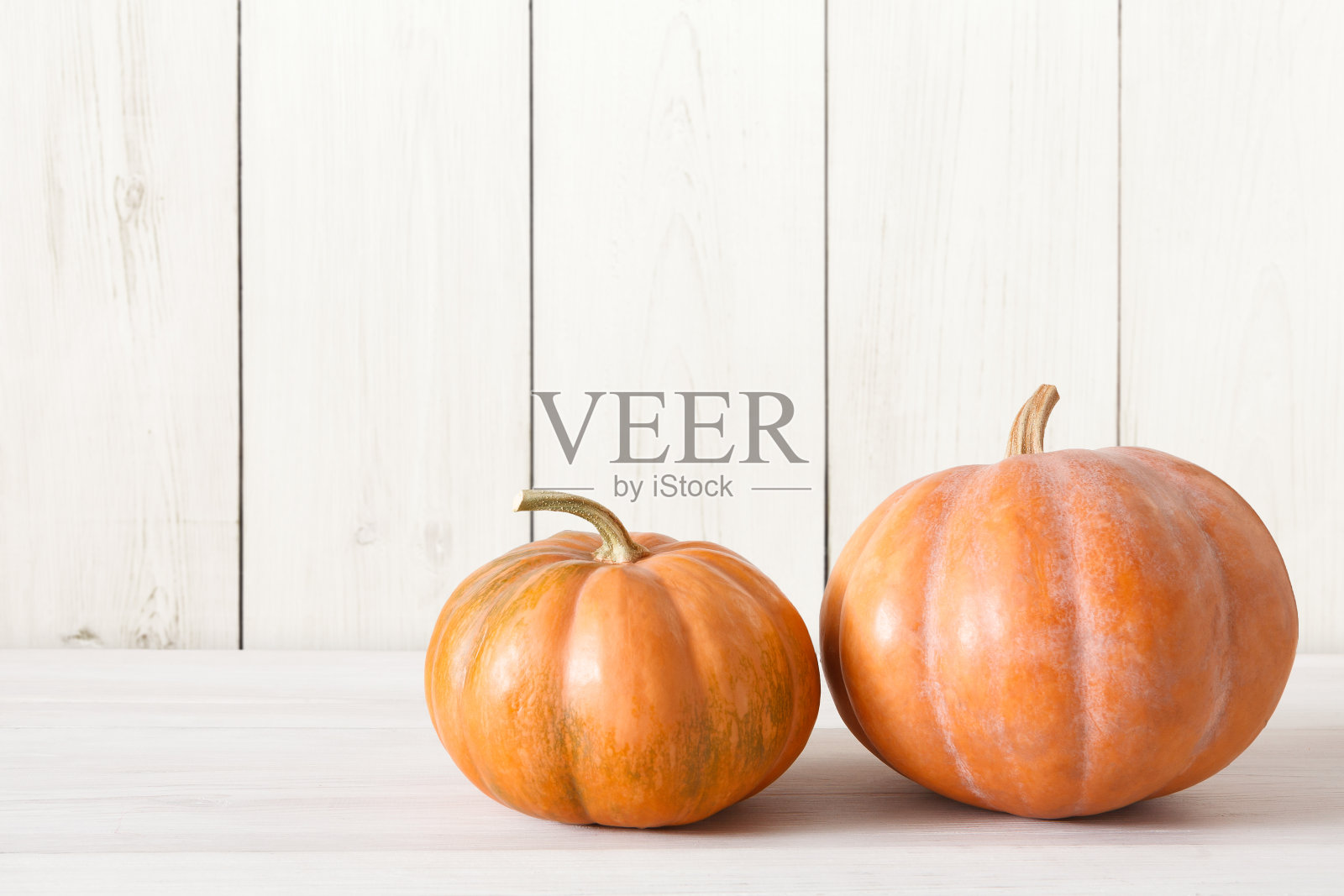 南瓜在白木背景与复制空间照片摄影图片