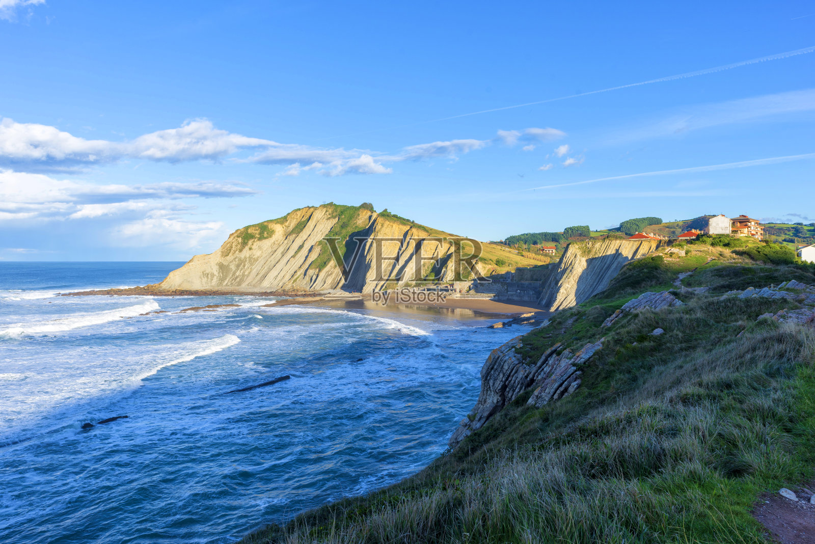 在一个晴朗的夏日，祖玛海岸照片摄影图片