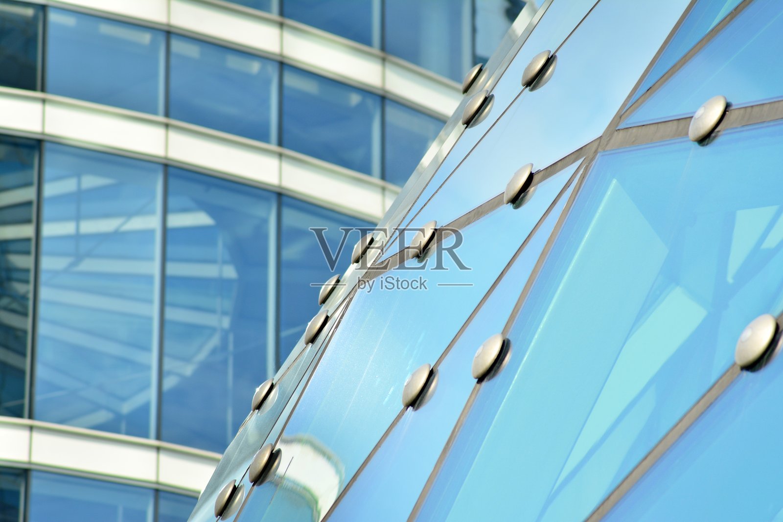 蜘蛛立面固定系统。外立面的紧固元素。外观细节。照片摄影图片