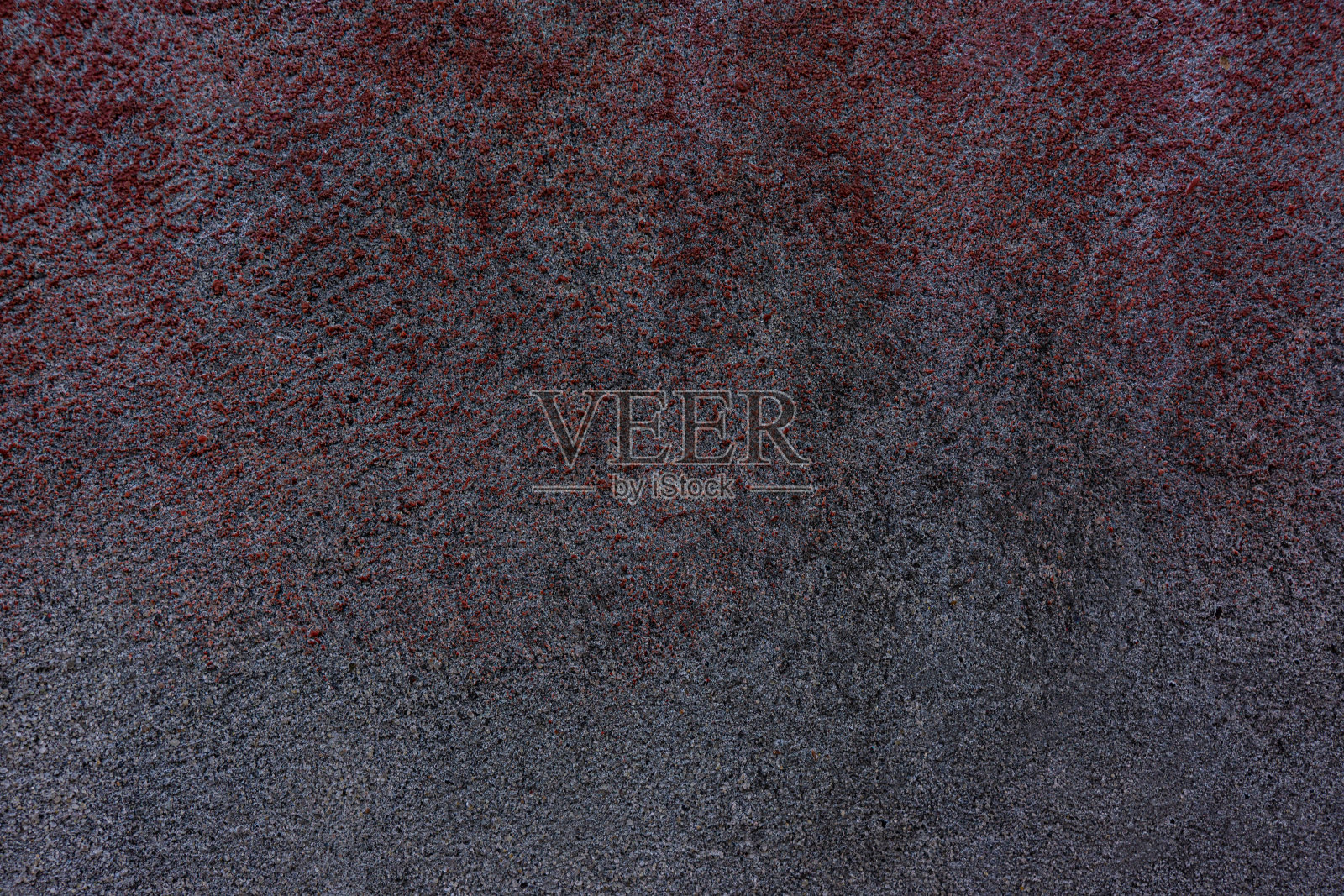 旧墙的灰泥表面，以家中红色油漆的痕迹作为抽象背景。照片摄影图片