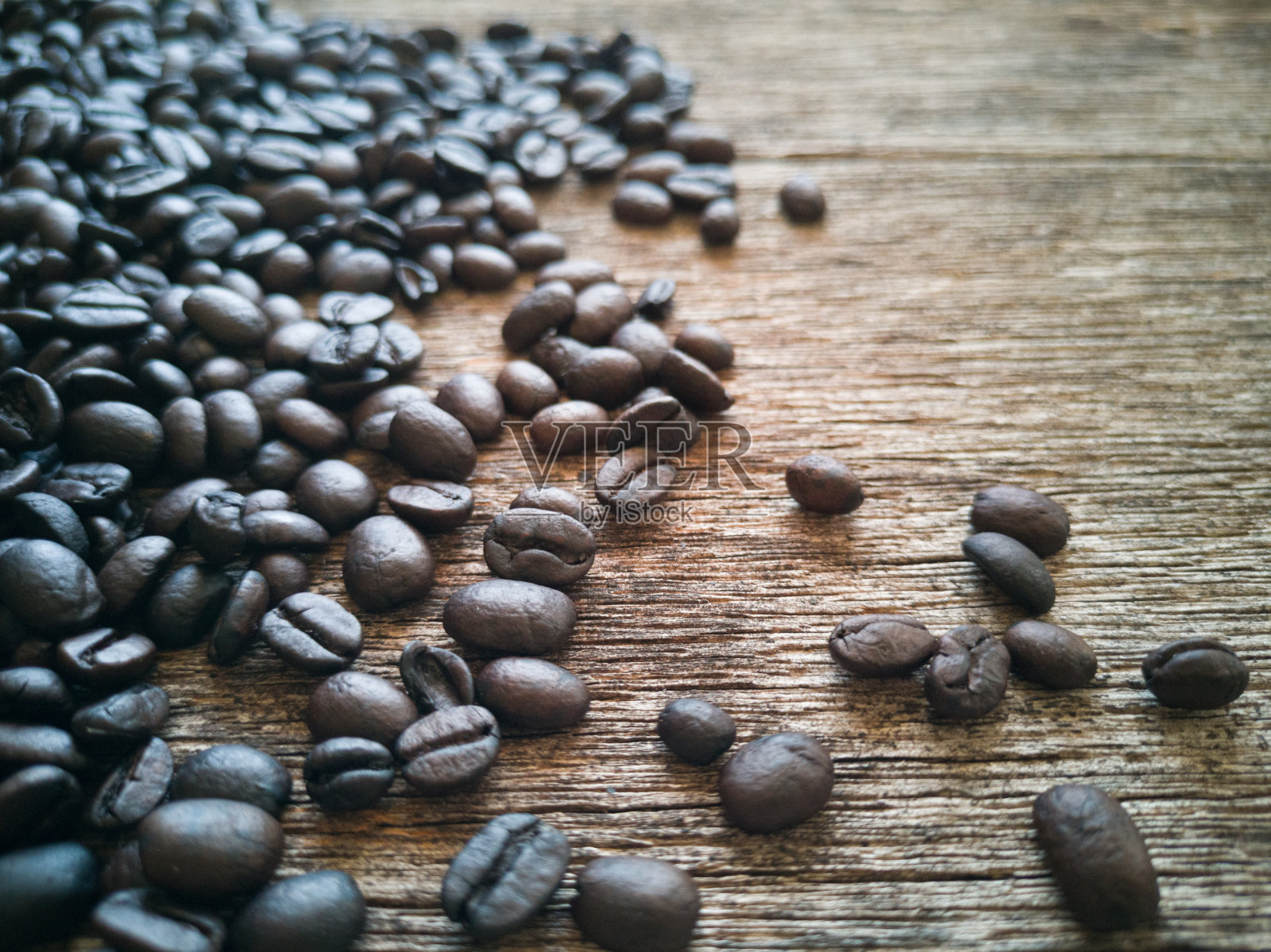 土木上的咖啡豆照片摄影图片