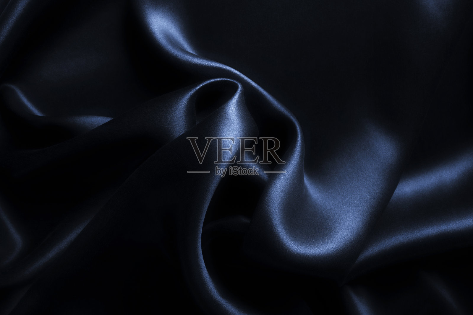 缎子蓝色丝绸背景，特写照片摄影图片