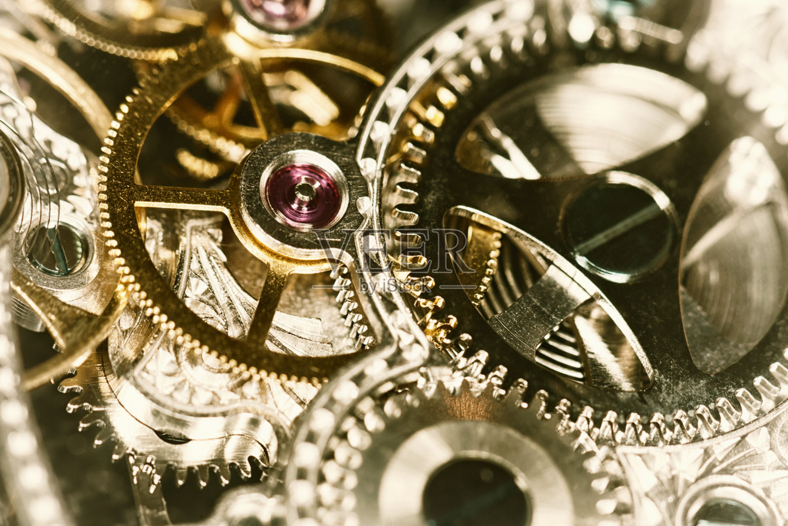 特写的金色钟表内部照片摄影图片