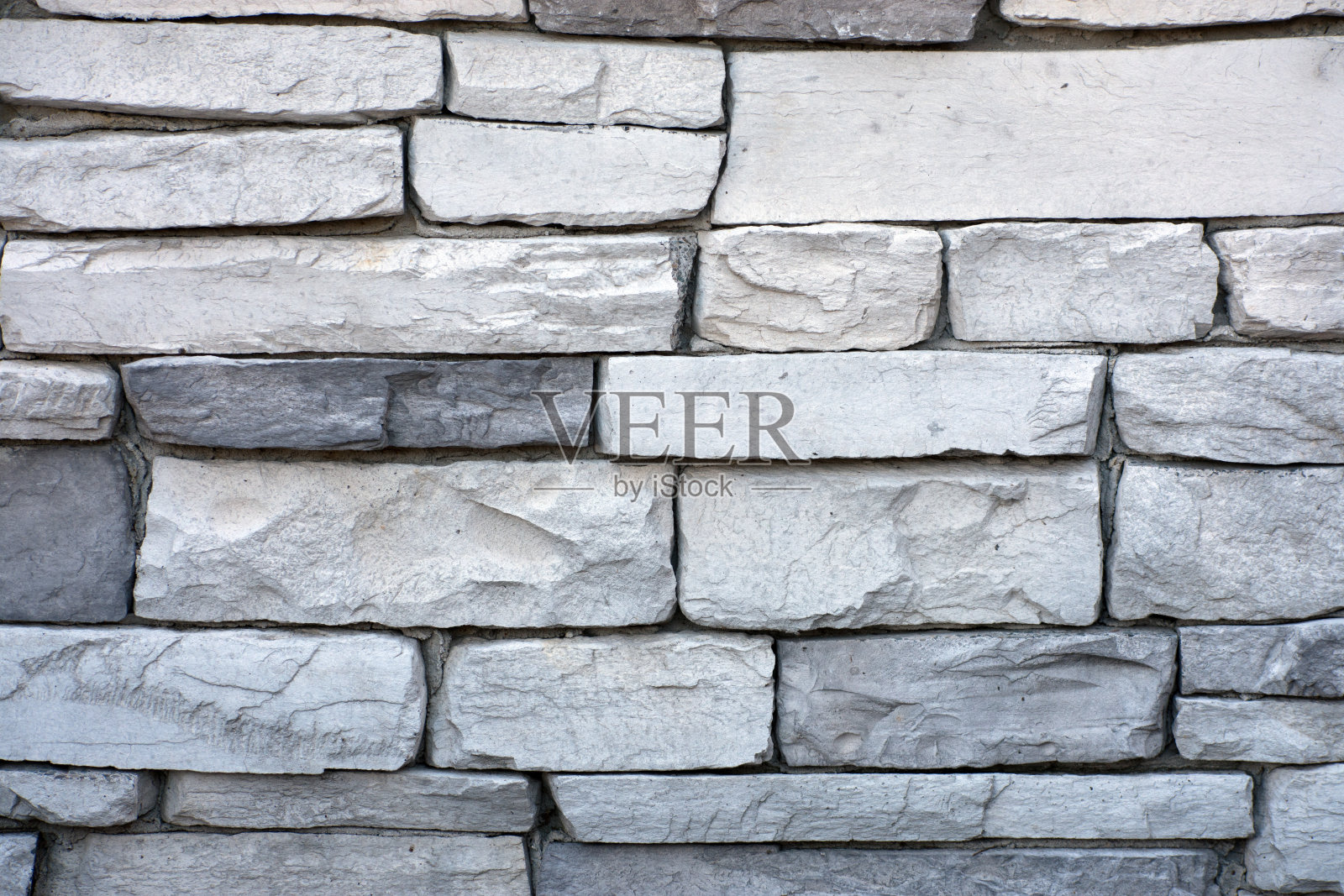 白色和灰色砖块的特写。照片摄影图片