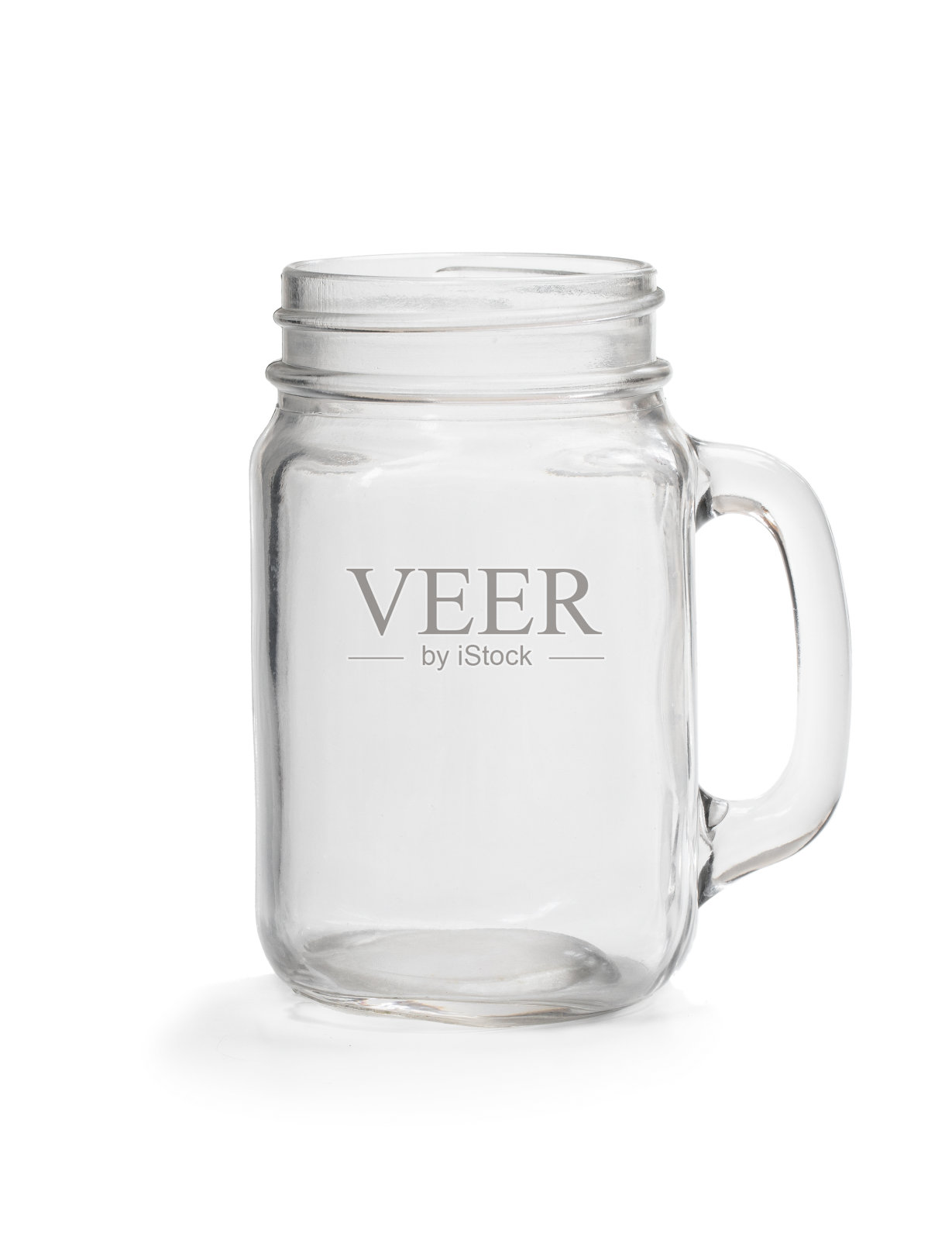 空玻璃罐，手柄隔离在白色上照片摄影图片