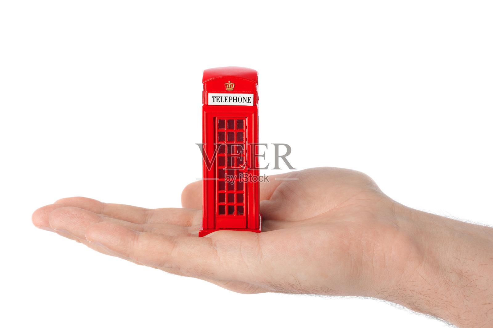 手持伦敦红色电话亭玩具照片摄影图片