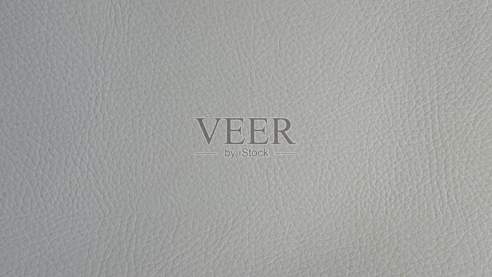 浅灰色人造或合成皮革背景与整洁的纹理和复制空间照片摄影图片