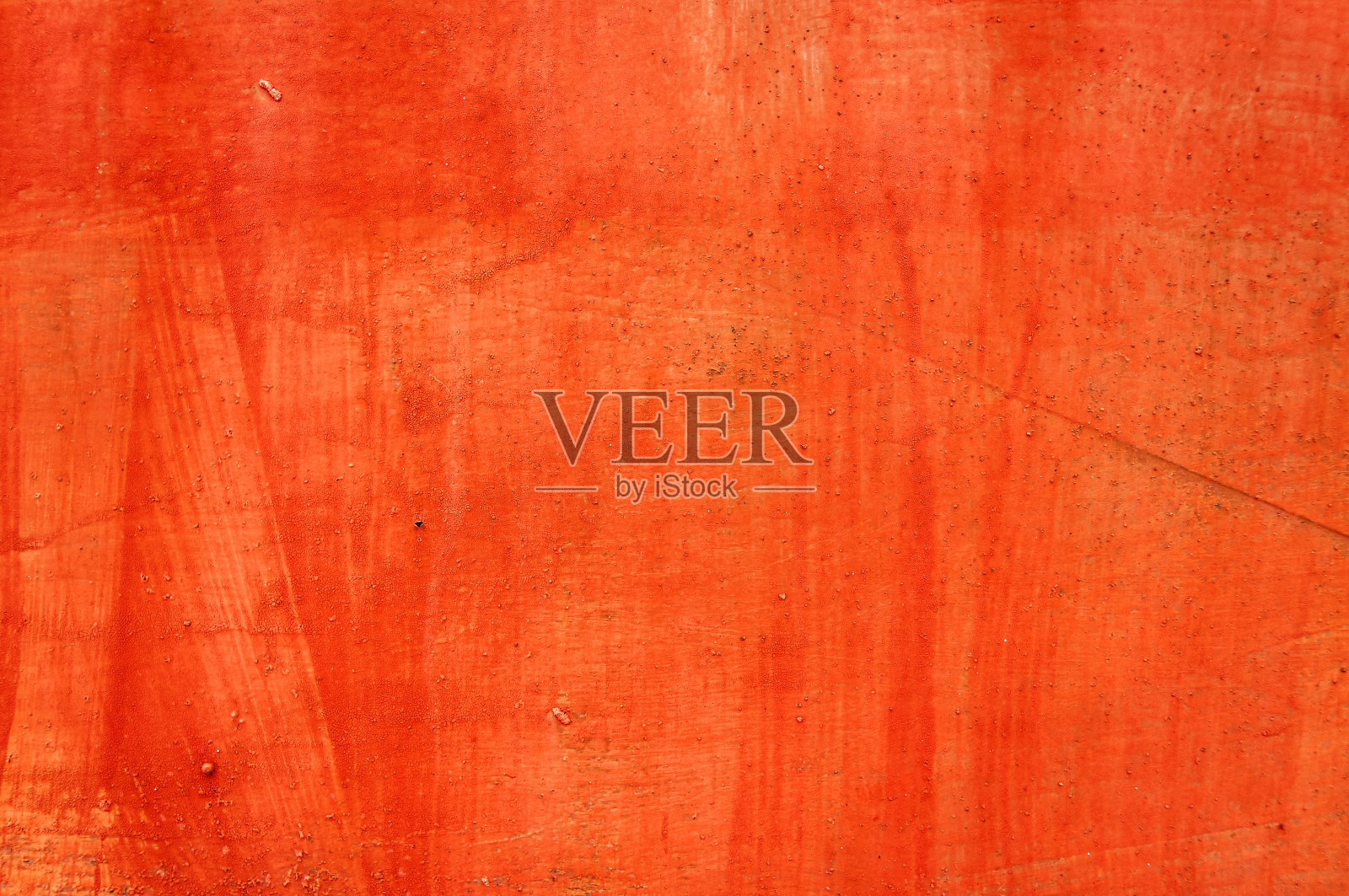 旧铁背景漆成红色不整齐。照片摄影图片