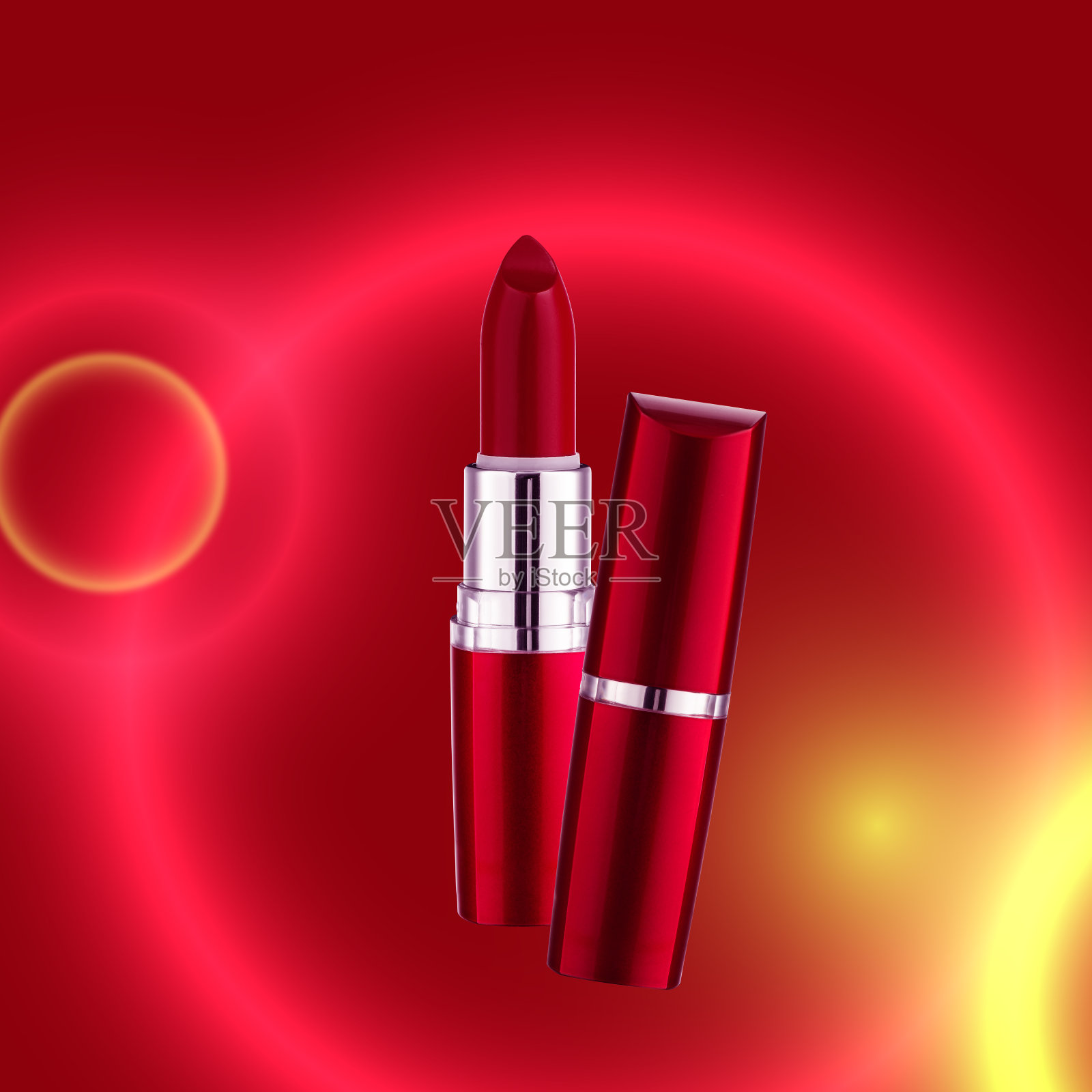 创意的广告照片上的口红与霓虹灯的背景。产品摄影。副本的空间。照片摄影图片