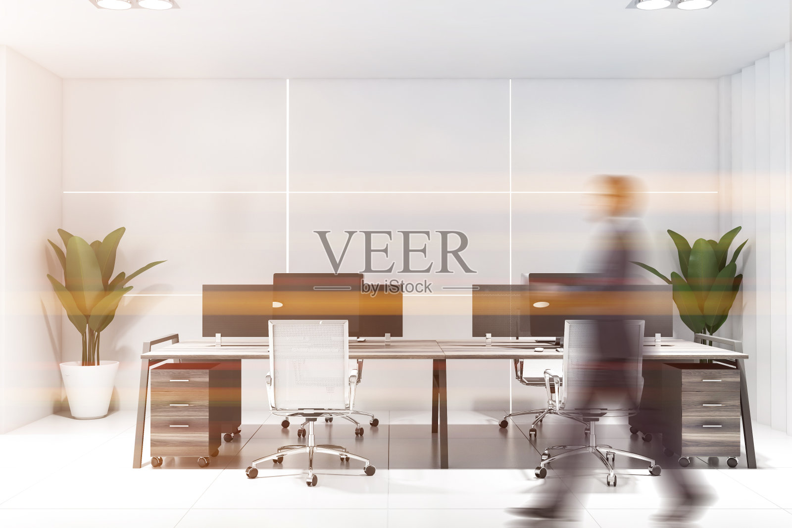 在白色办公室中行走的商人照片摄影图片