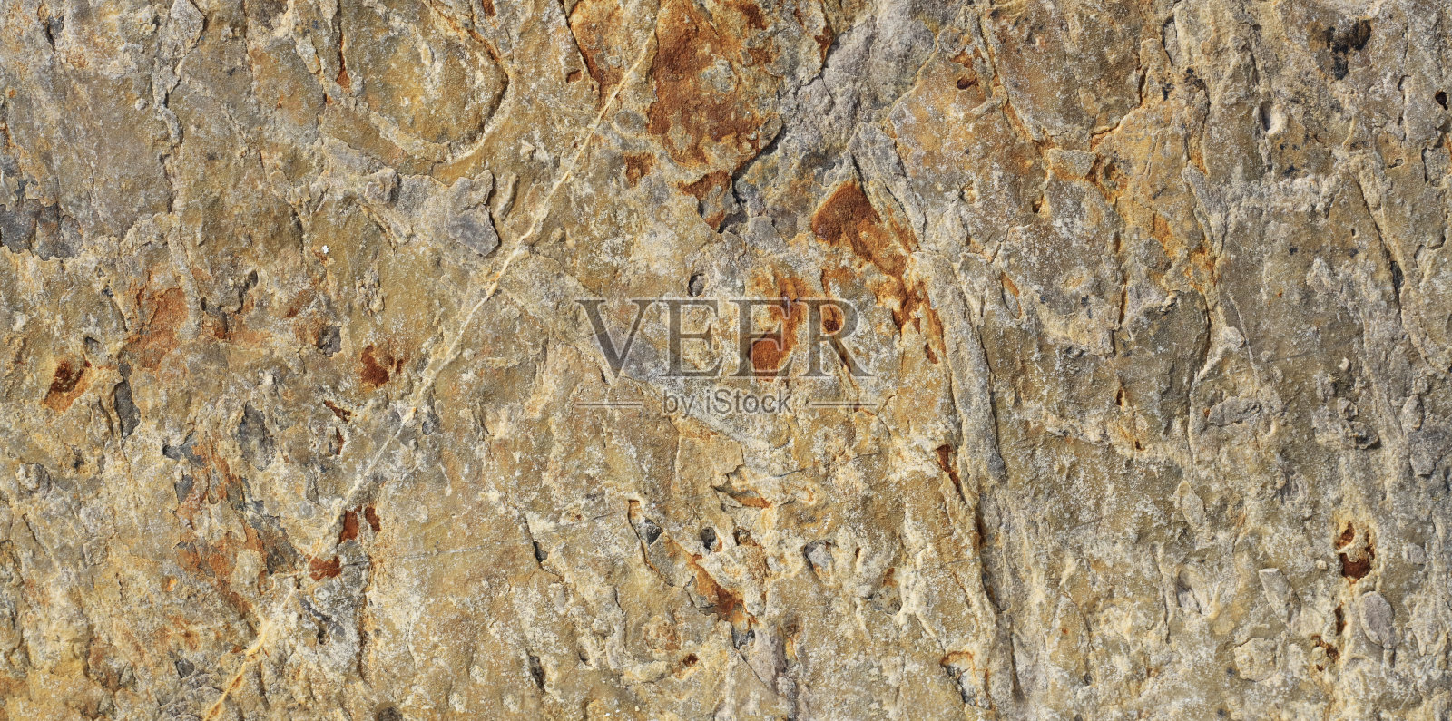 黄色的石头背景。照片摄影图片