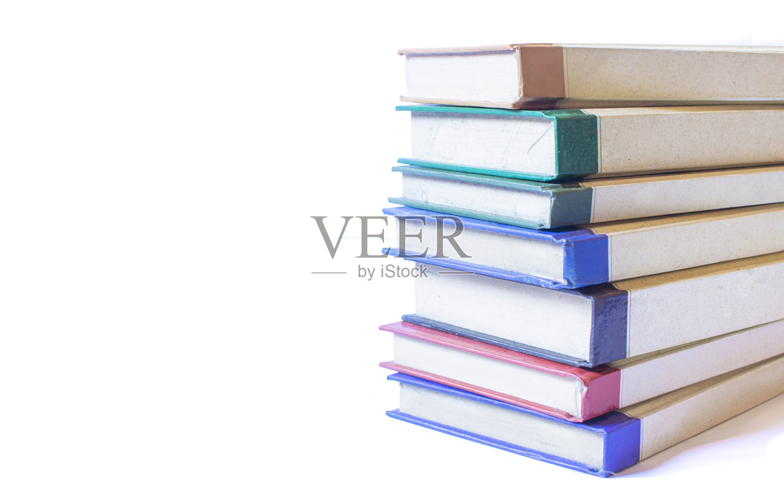 一组彩色的书孤立在白色的背景与文字空间照片摄影图片