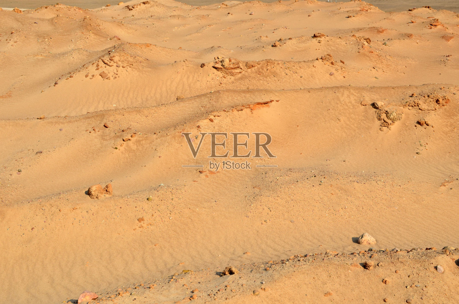 砂石质地来源于砂堆，土壤的地质研究照片摄影图片