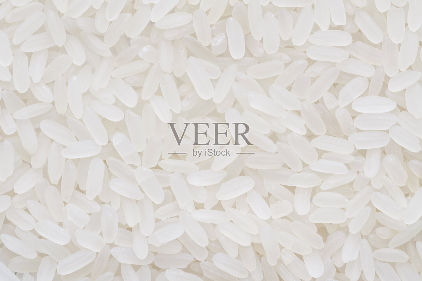 长白米的背景。特写镜头照片摄影图片