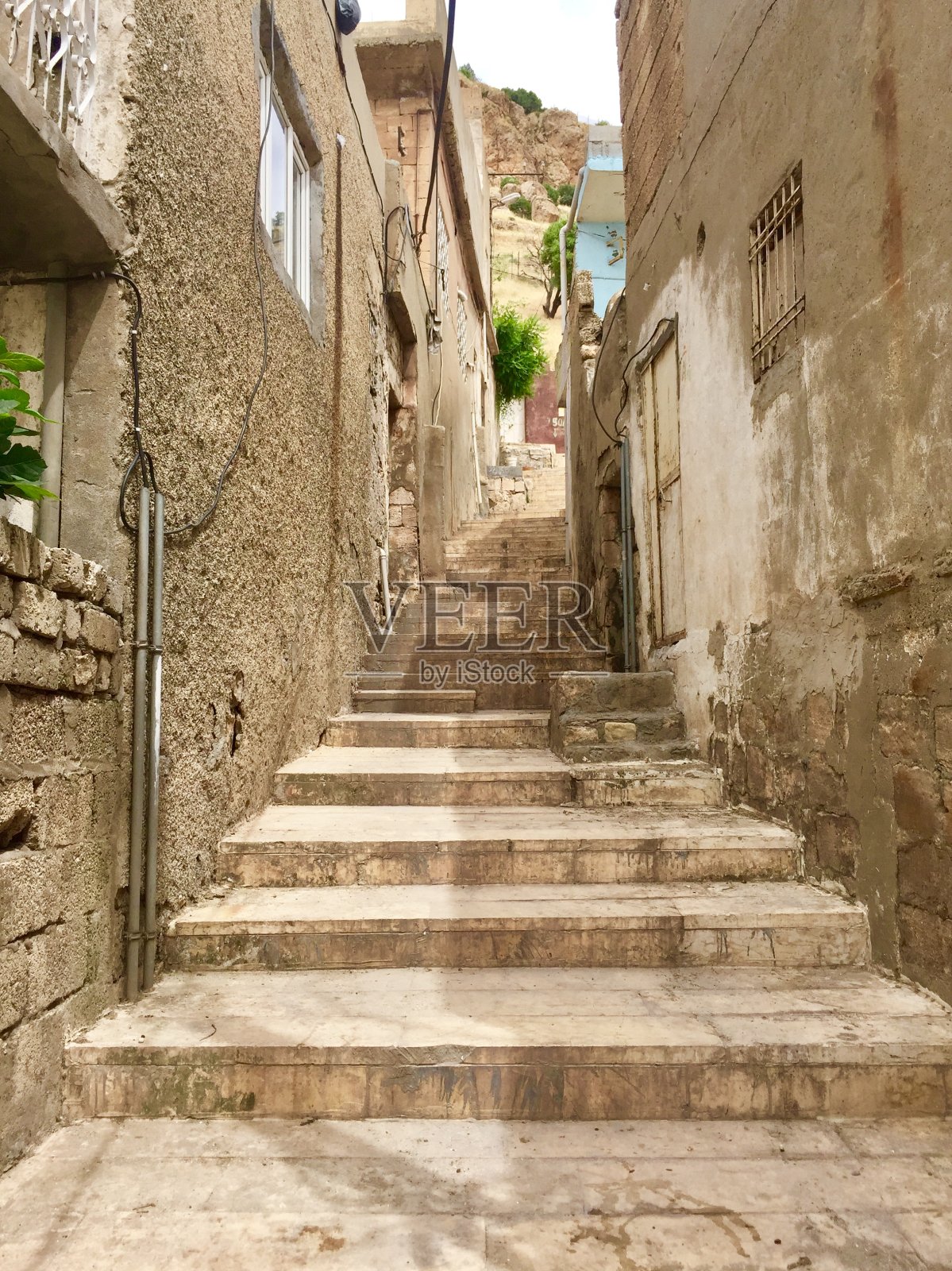 土耳其安那托利亚东南部的彩色石头房子门到门的入口门楼梯踏板照片摄影图片