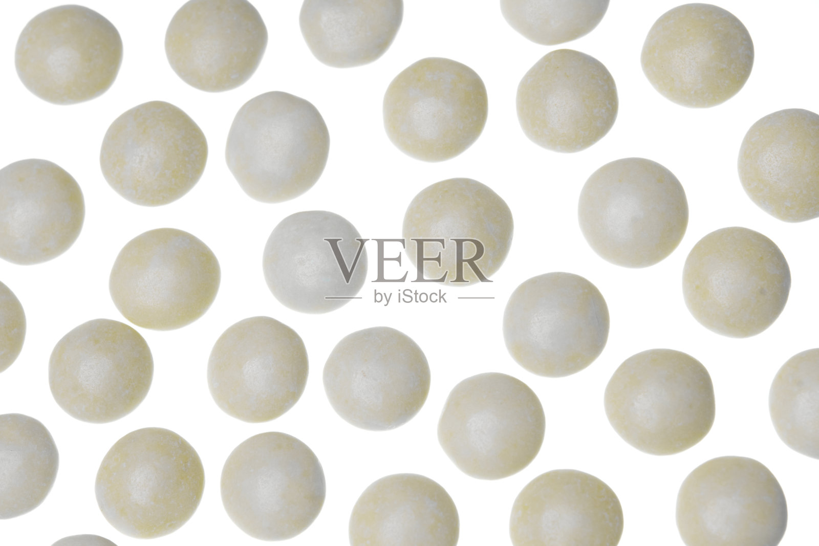 粉黄色糖衣巧克力糖照片摄影图片