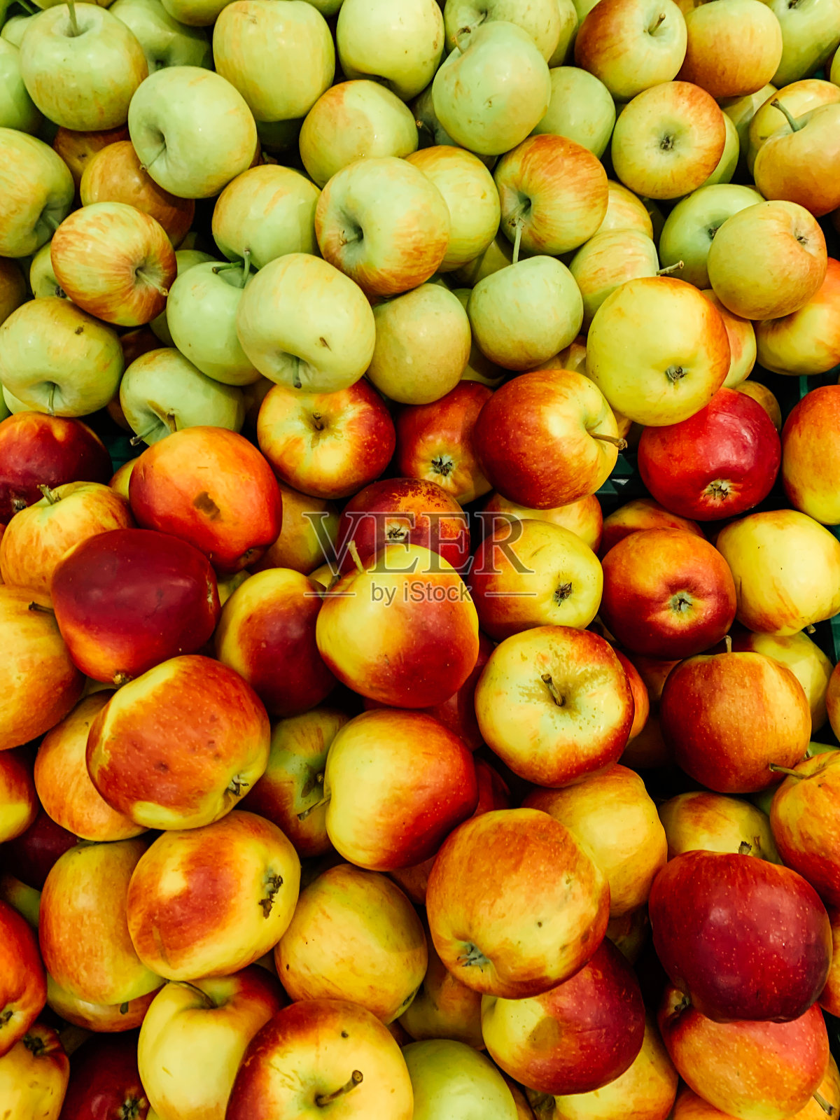 红绿的成熟水果，苹果吃起来像一个背景照片摄影图片