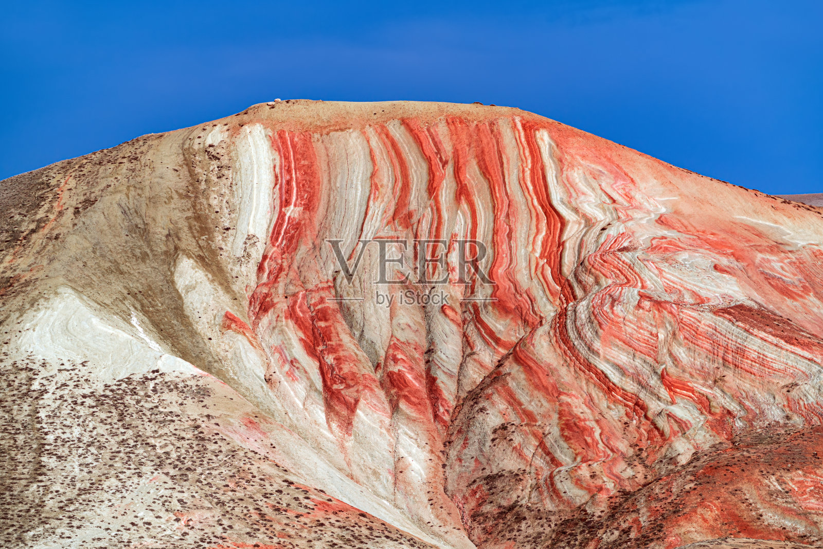惊人的红色山峰的顶峰照片摄影图片