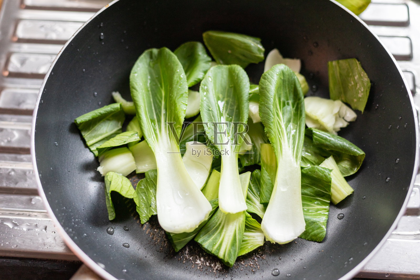 菜心或白菜或白菜蔬菜在锅里照片摄影图片