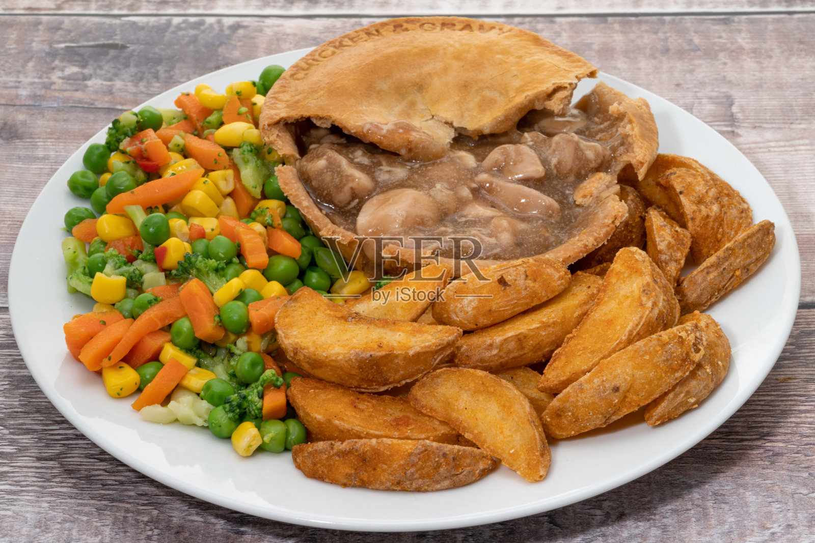 鸡肉蔬菜派照片摄影图片