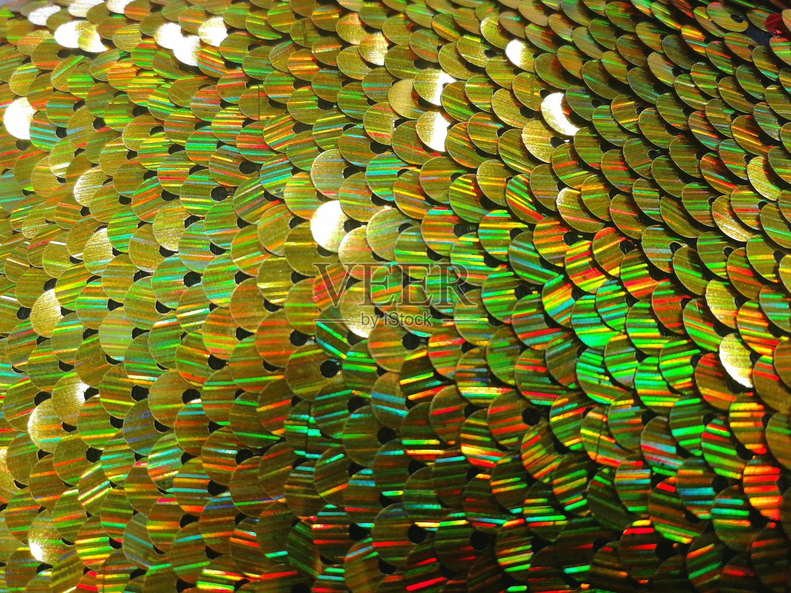 闪亮抽象的绿黄色背景。纹理。照片摄影图片