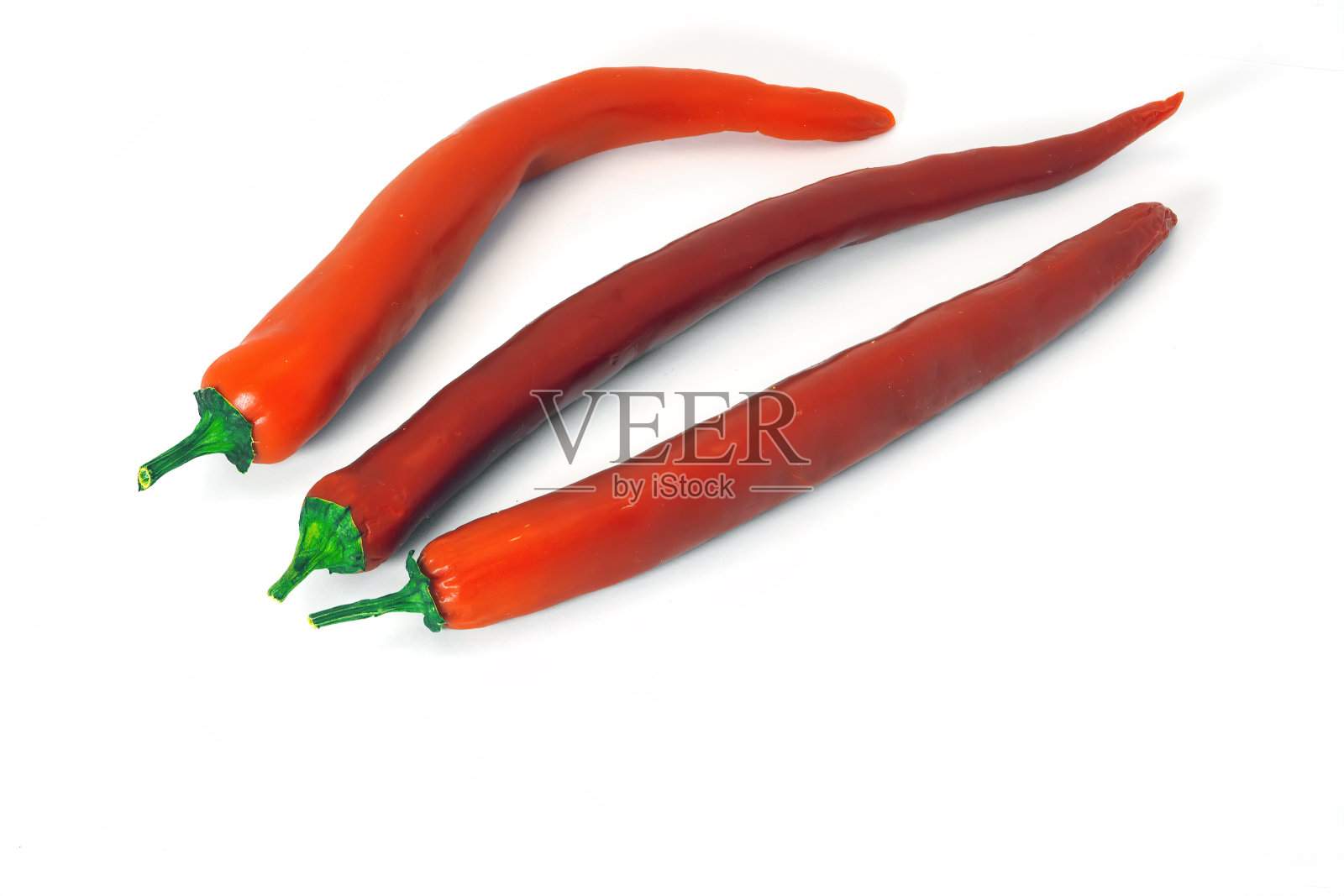 红辣椒孤立在白色背景下。照片摄影图片