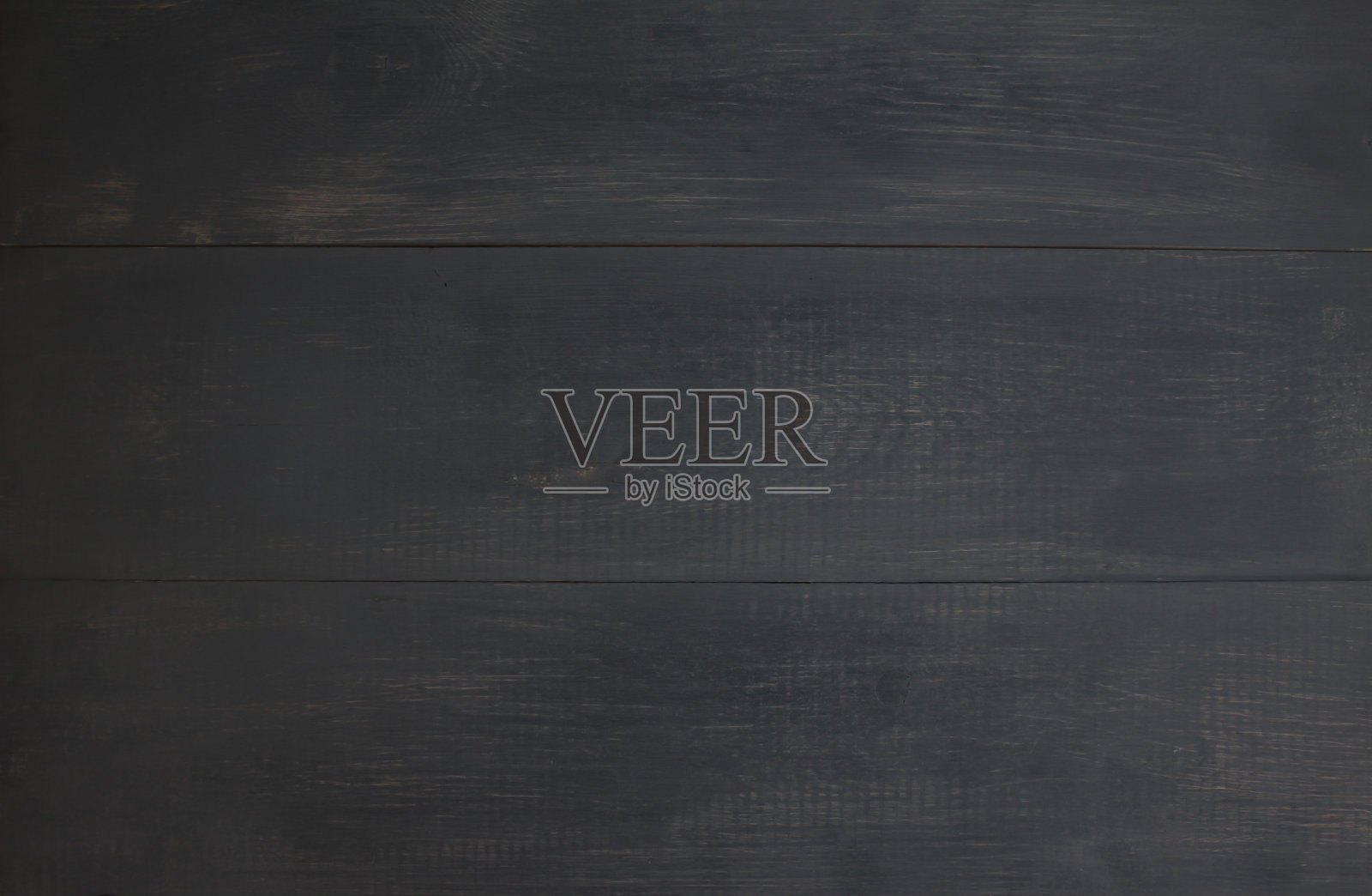 木制的灰色、肮脏、老化的照相电话。照片摄影图片