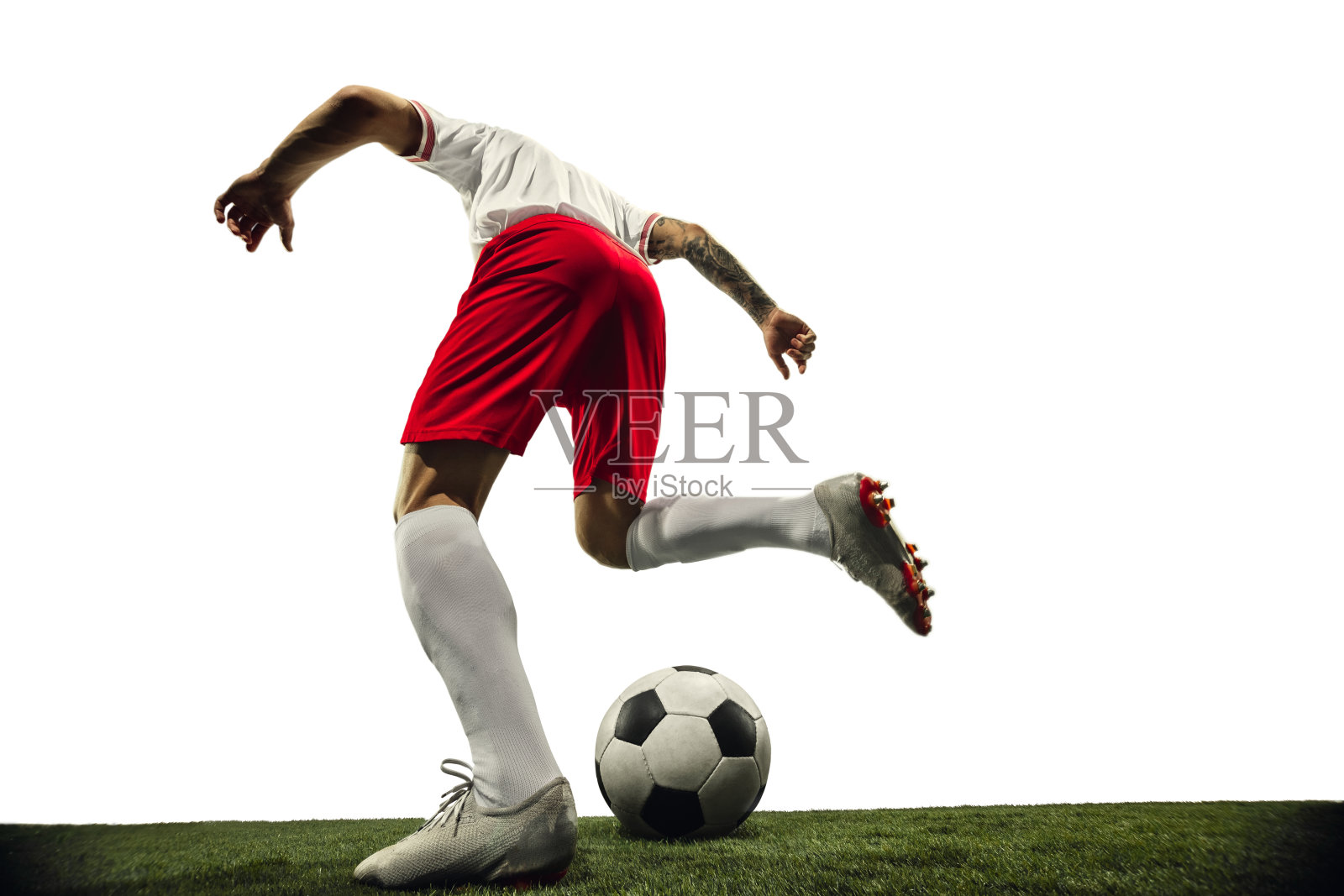 足球或足球运动员在白色背景-运动，行动，活动的概念照片摄影图片
